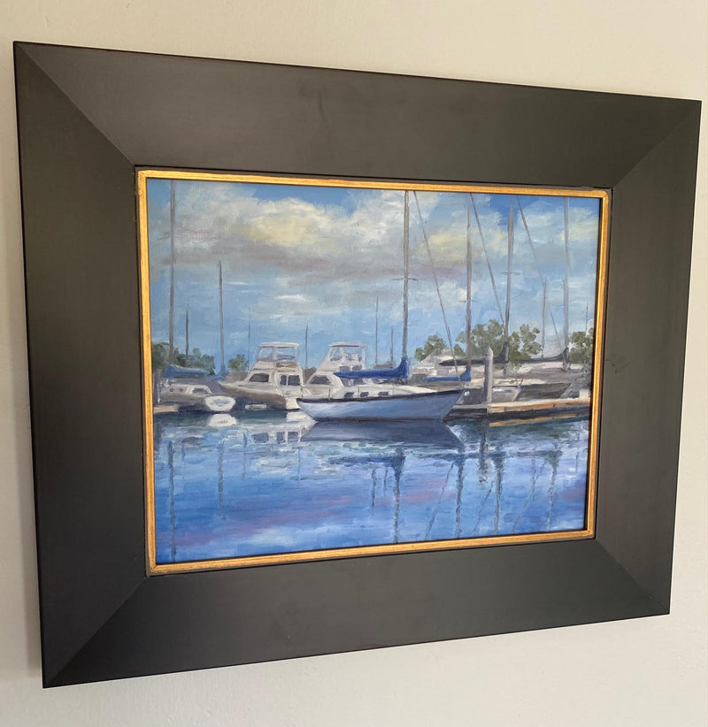 Image of an original oil painting of a calm day in Dana Point Harbor by Steve Sandborg Art shown in recommended frame