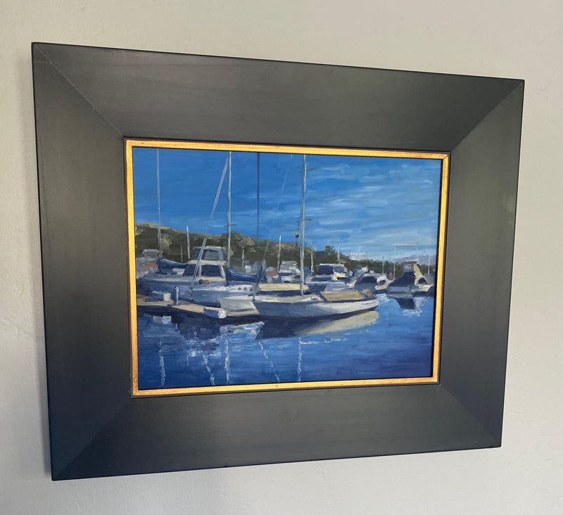 Image of an original plein air oil painting of boats in Dana Point Harbor by Steve Sandborg Art.  Shown in optional frame. 