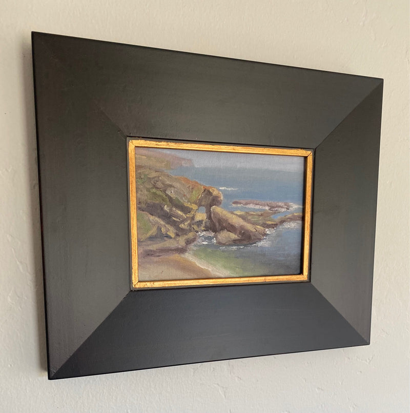 Image of an original oil painting of the famous arch rock in front of the Montage Hotel in Laguna Beach by Steve Sandborg Art. Shown in optional frame. 