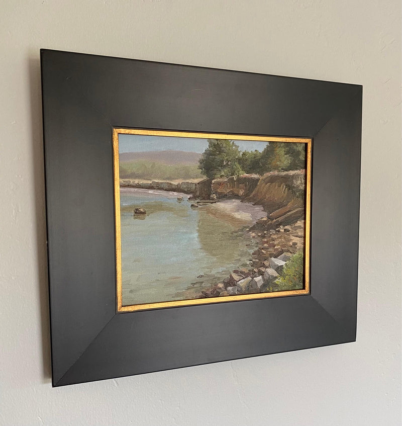 Image of an original oil painting of a peaceful  coastline by Steve Sandborg Art.  Shown in optional frame. 